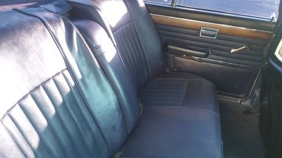 A close up of the back seat of a car