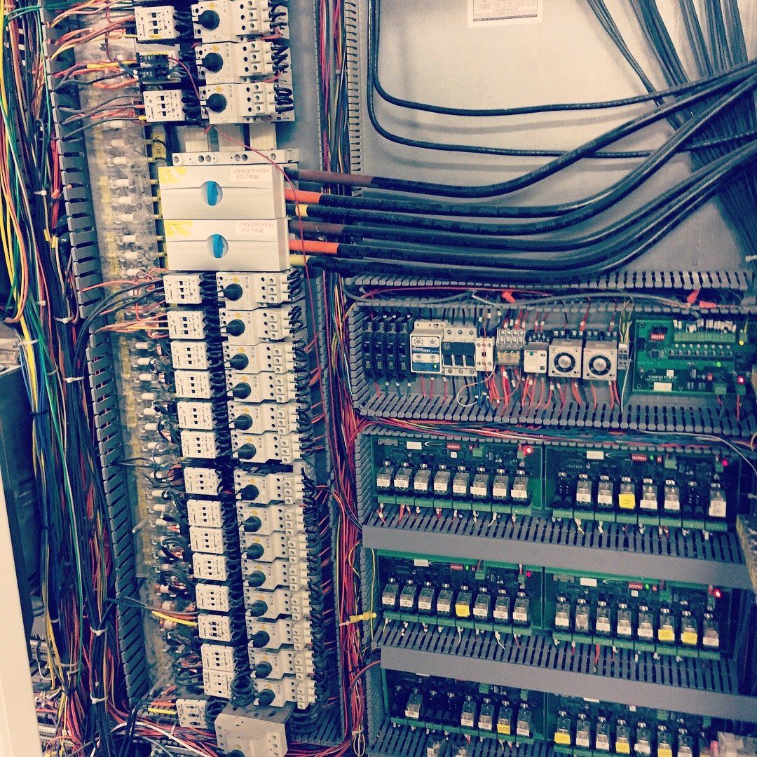 A very large electrical box with lots of wires