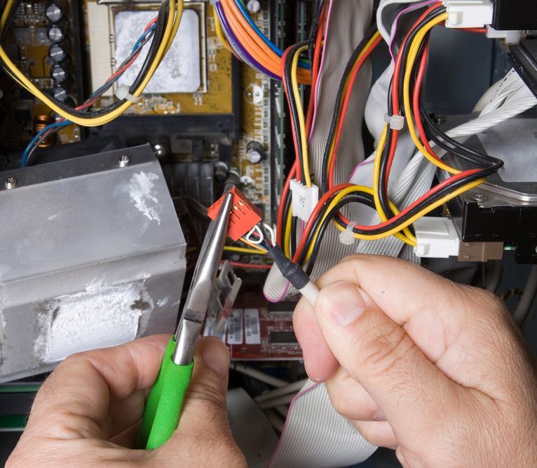 A Man Working On An Electrical Box — Steve Mason Electrical In Port Macquarie, NSW