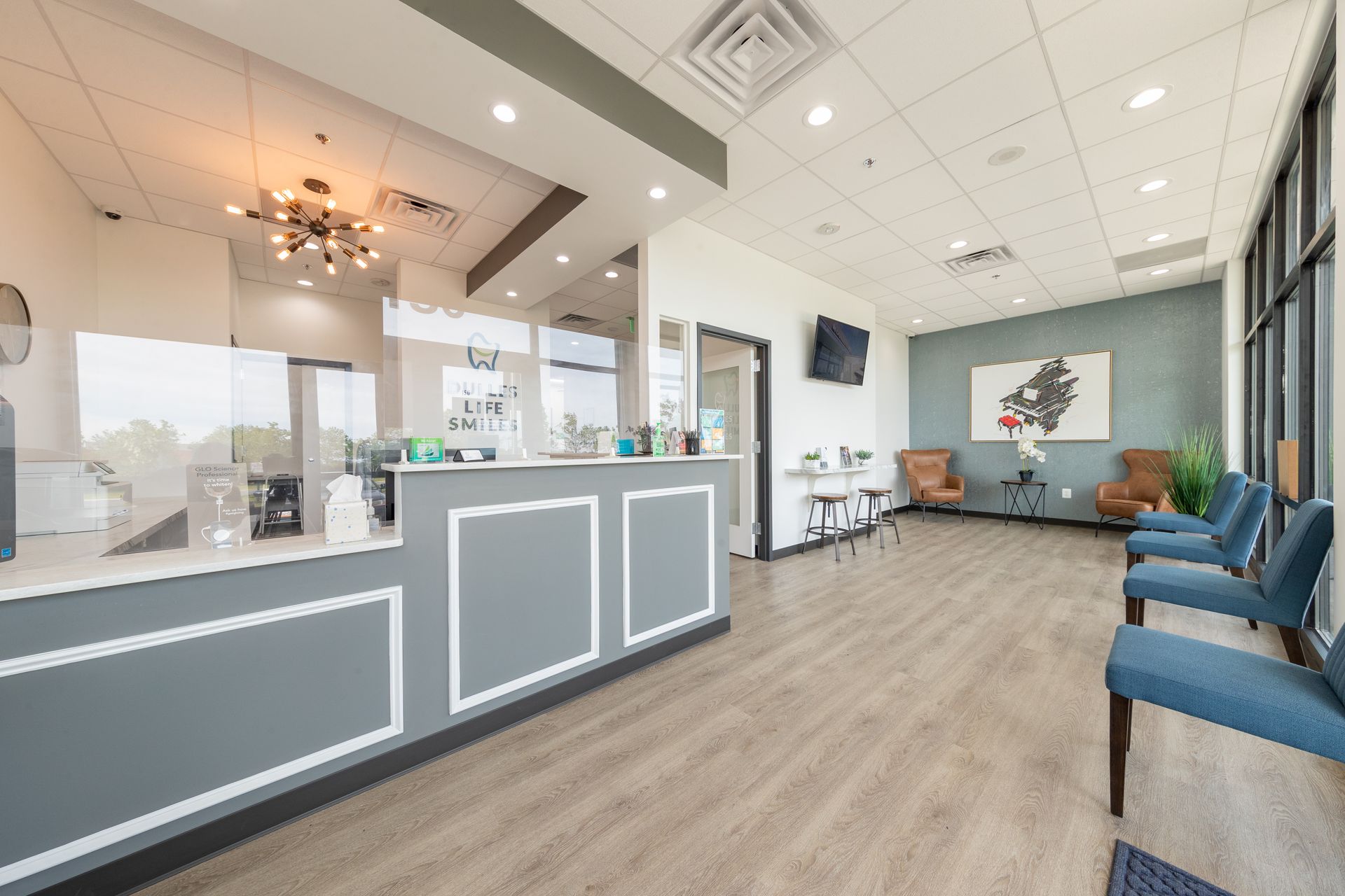 Dulles Life Smiles dental office waiting room and reception desk.