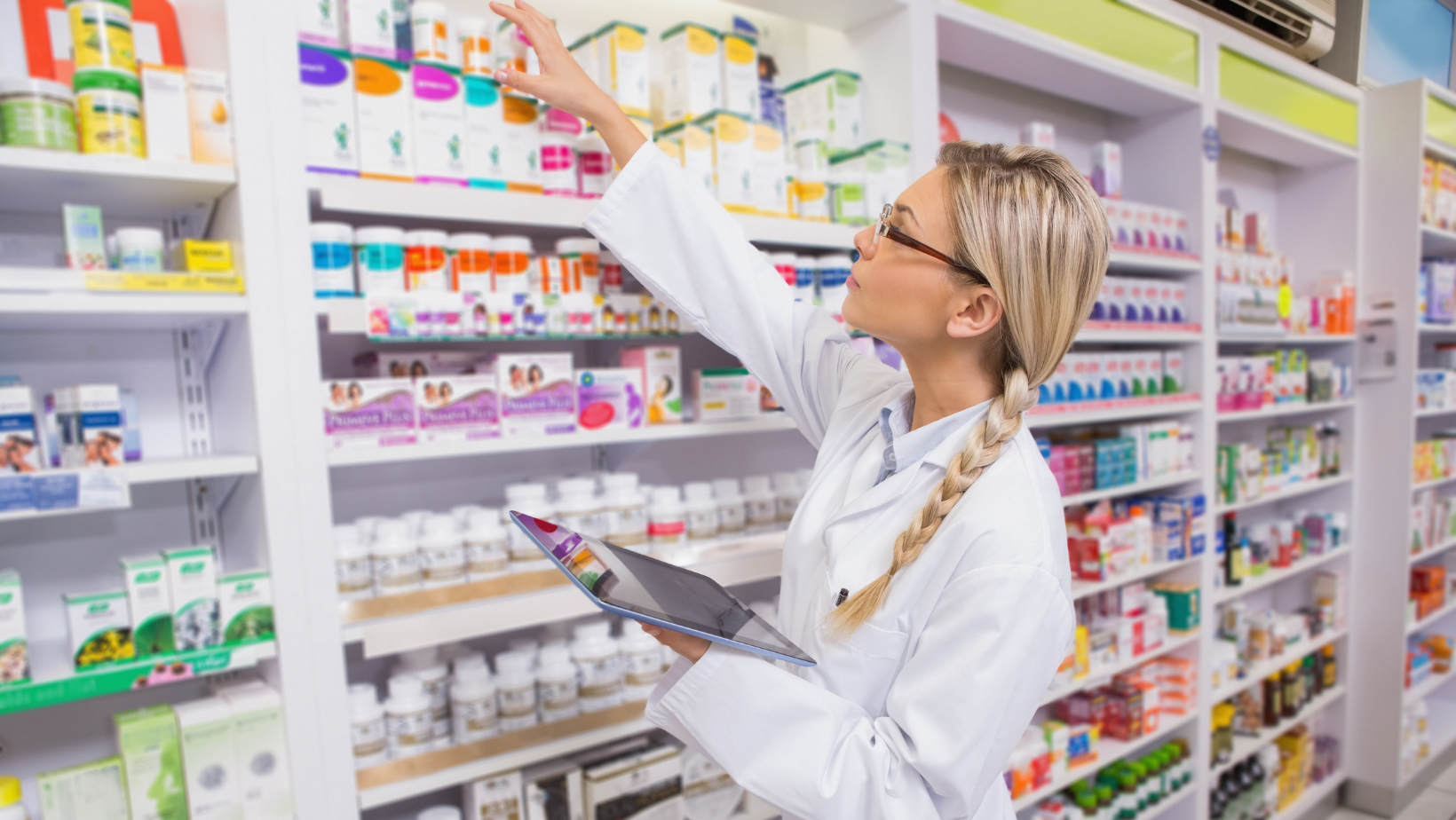 woman looking at medicines