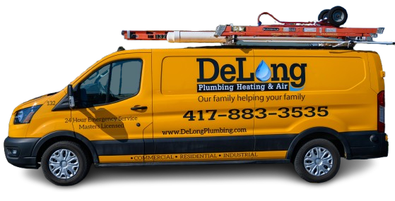 A group of people are posing for a picture in a building.