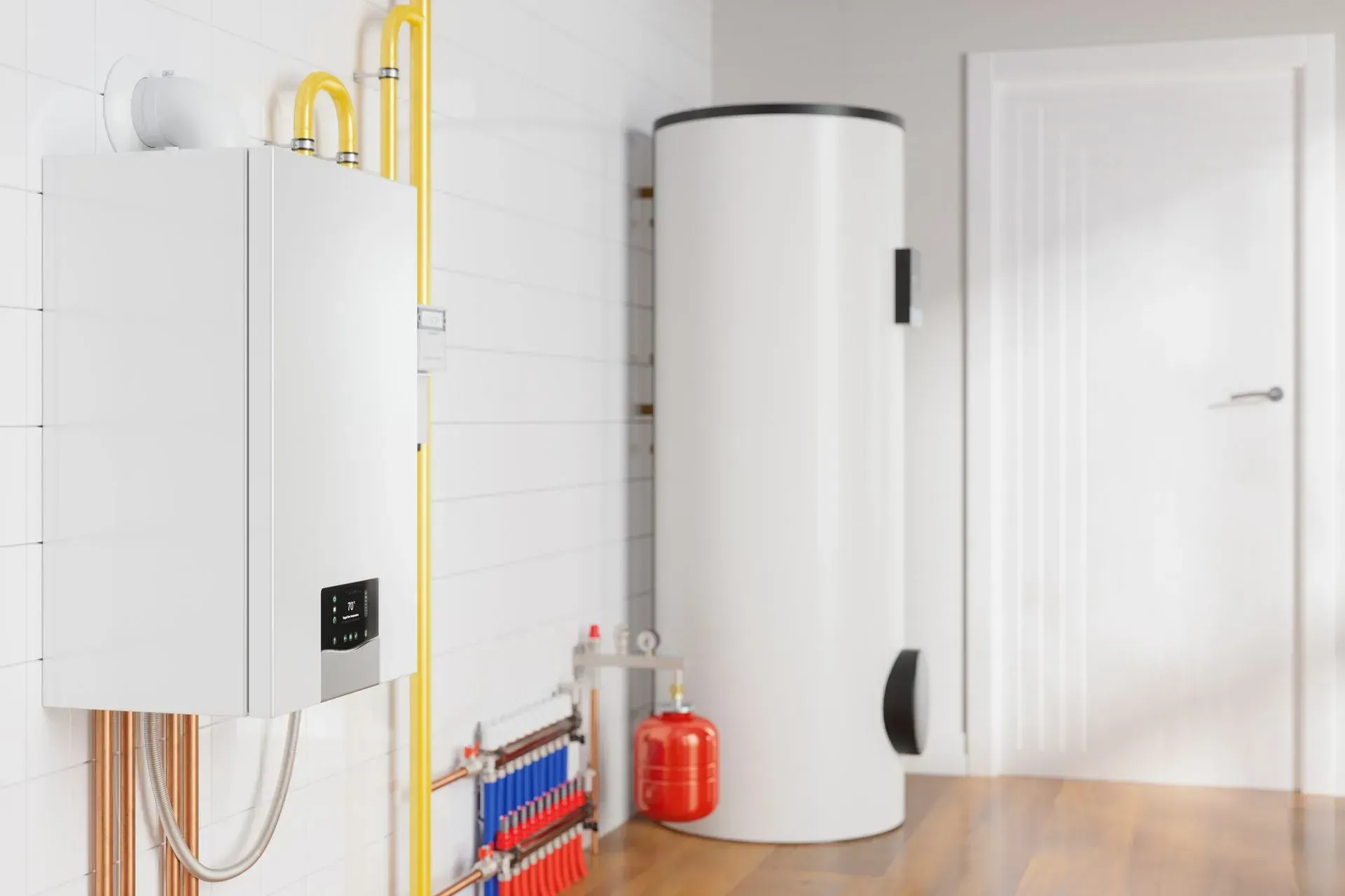 Two white water heaters in a corner of a room with yellow and copper pipes, a red cylinder, and a white door. Two white water heaters in a corner of a room with yellow and copper pipes, a red cylinder, and a white door.