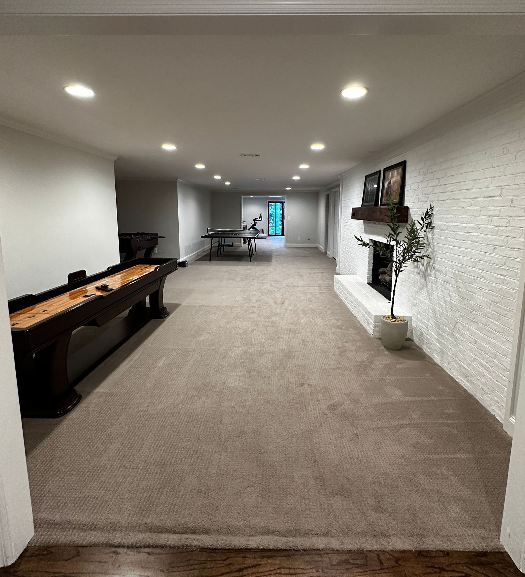 A long living room with carpet