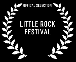 A white laurel wreath with the words `` little rock festival '' on a black background.