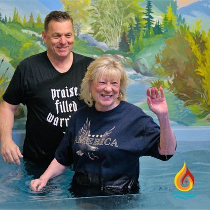 a man and a woman wearing shirts that say praise filled warr