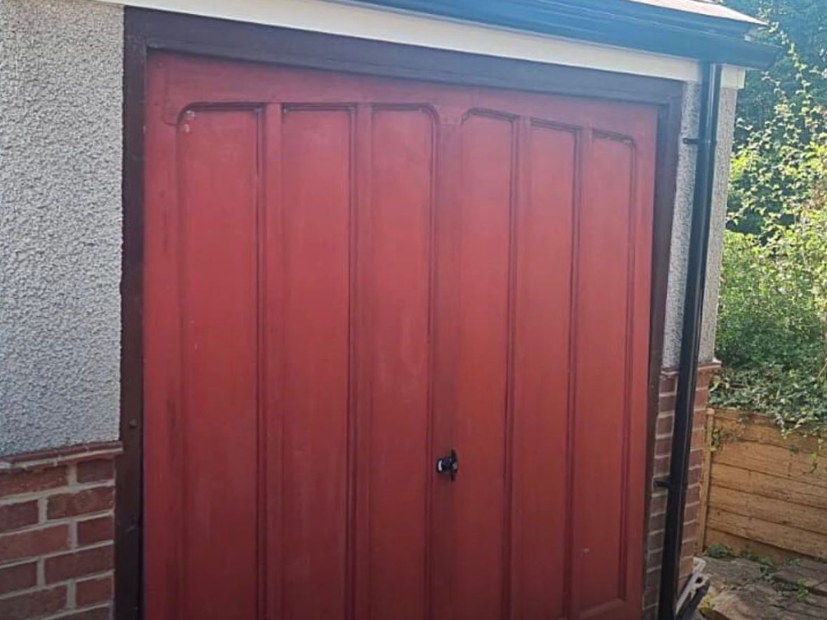 GARAGE DOOR SPRAYING BEFORE