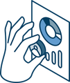 A hand is holding a piece of paper with a pie chart on it.