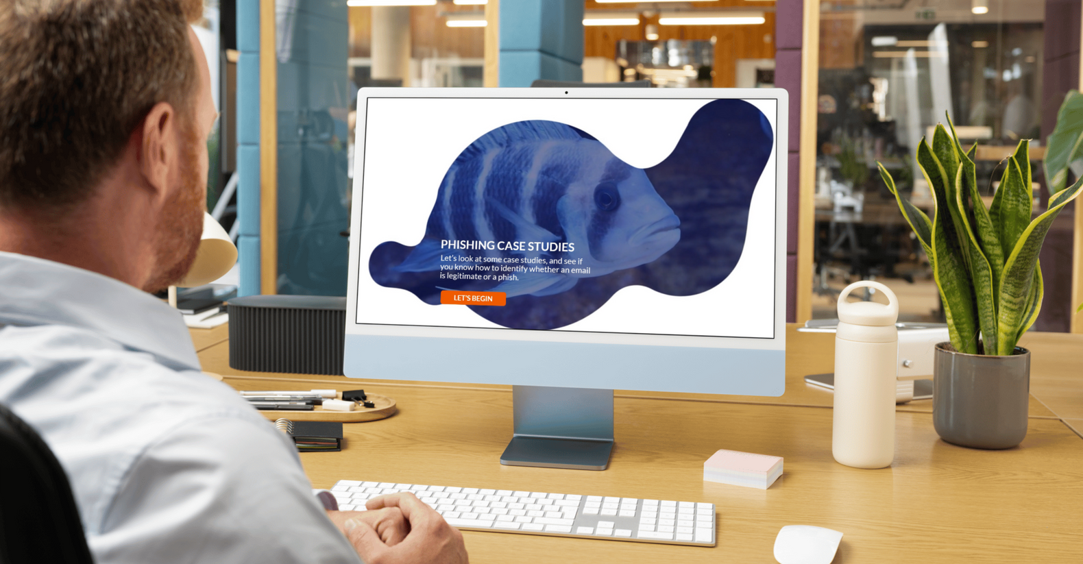 A desktop computer showing an interactive elearning module.