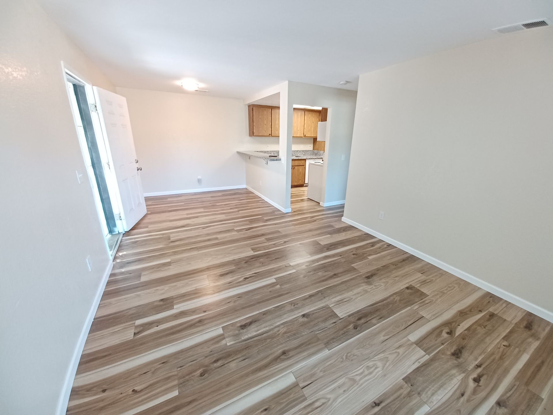 A building with stairs leading up to the second floor