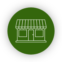 White outline of a storefront with awning inside a dark green circle.