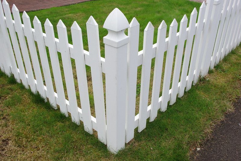 A clean, white vinyl fence post in Columbus Ohio