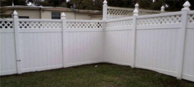 A clean vinyl fence after being powerwashed.