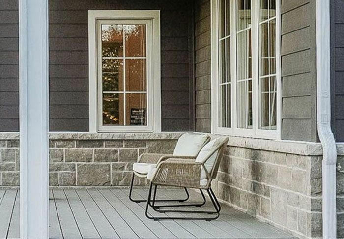 a house showcasing celect pvc siding with a porch
