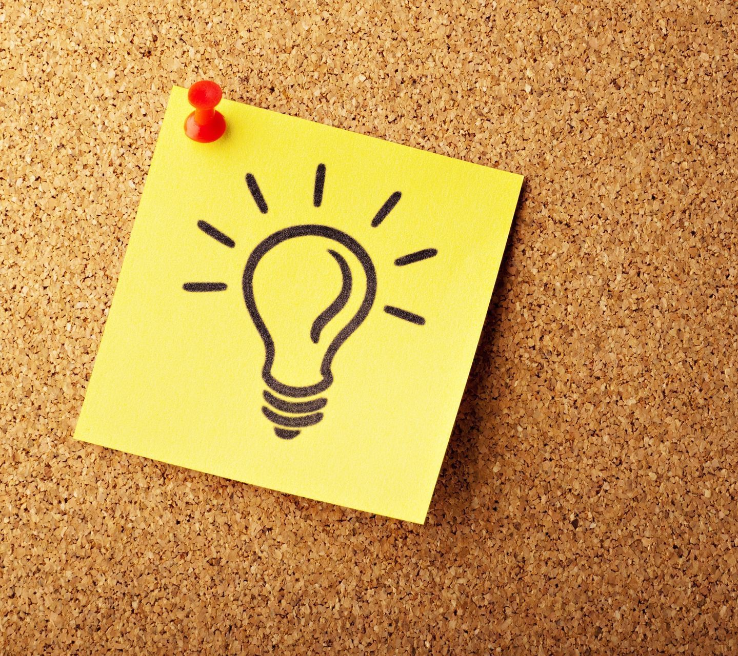 lightbulb on a sticky note