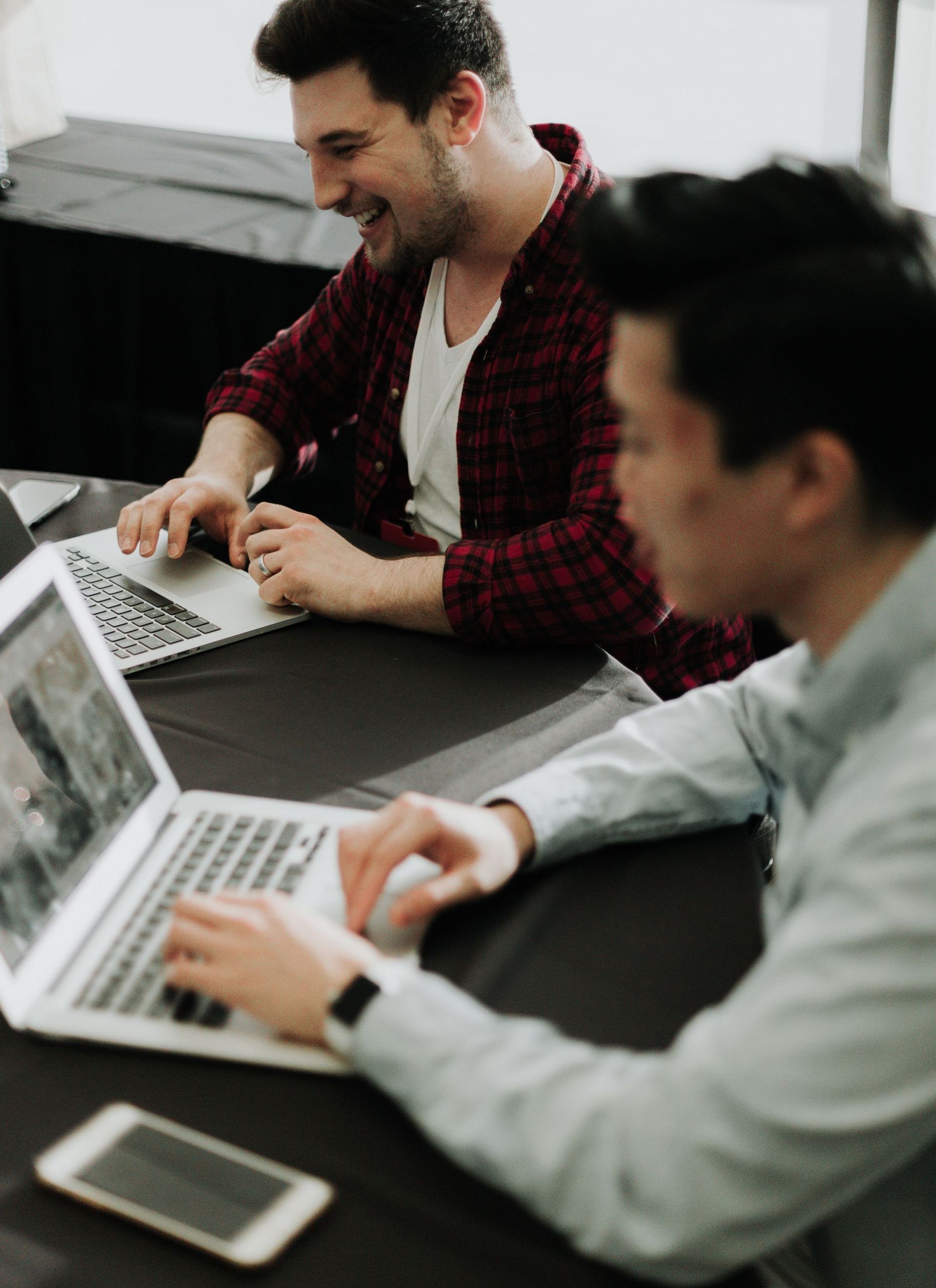 2 men working