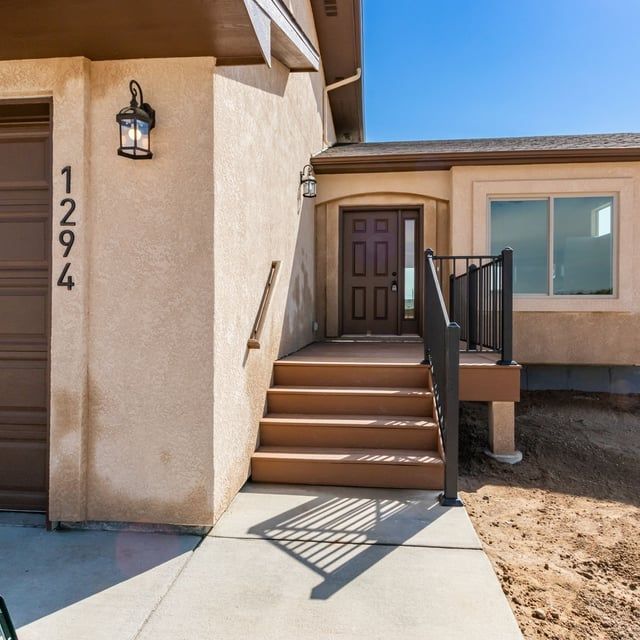 A house with the number 1294 on the side of it