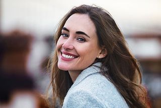 Female Smiling with beautiful teeth- Dental care in Yorktown, VA