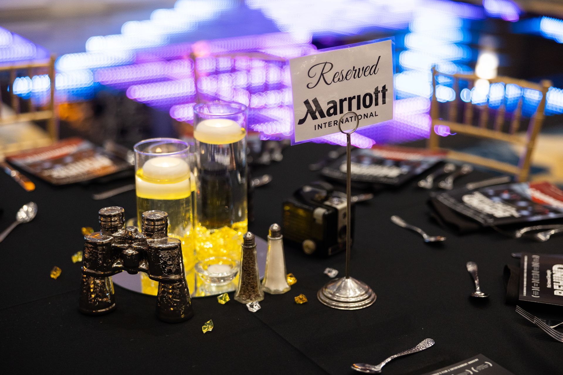 A table with a reserved marriott sign on it