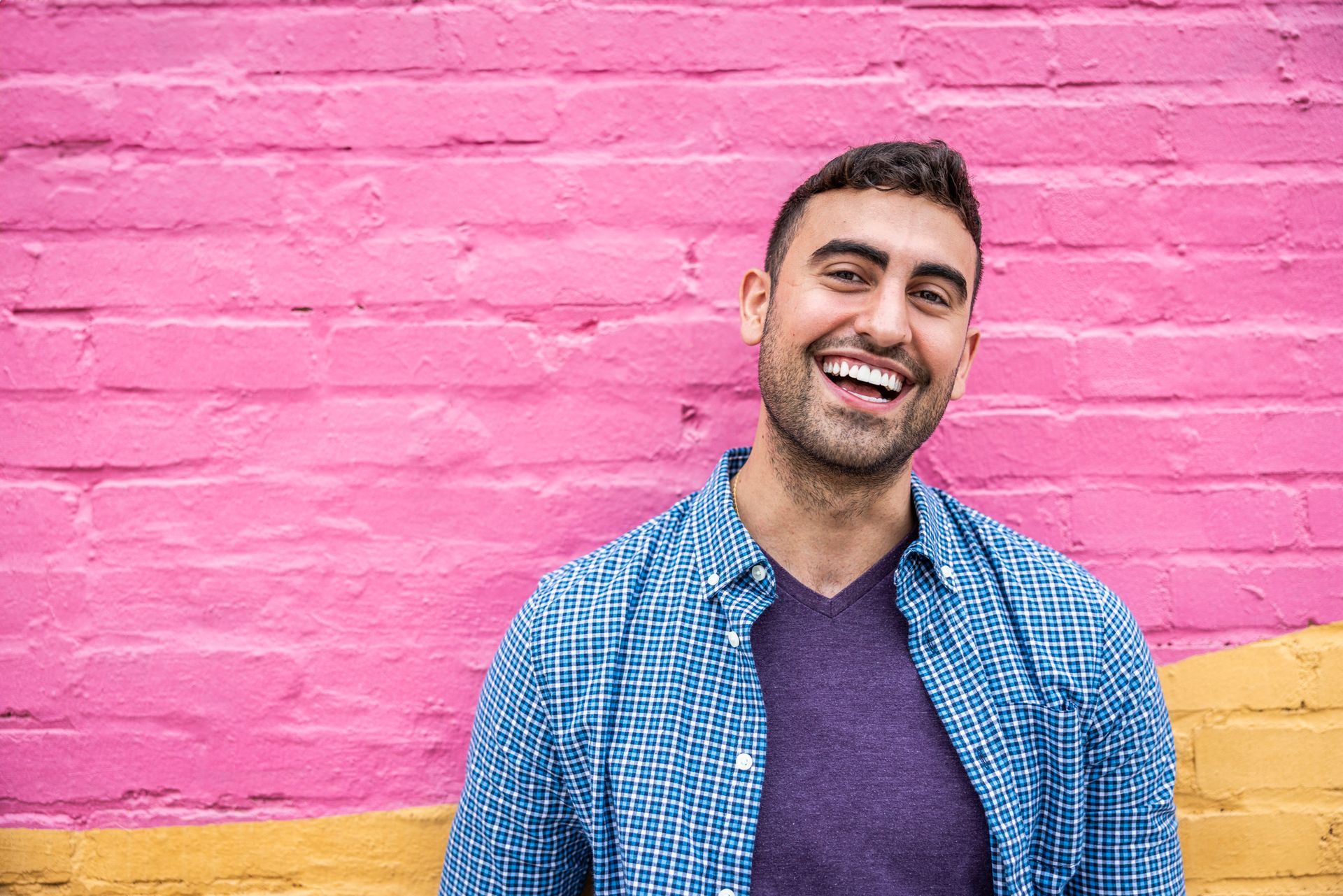 A close up of a person's teeth being examined by a dentist.