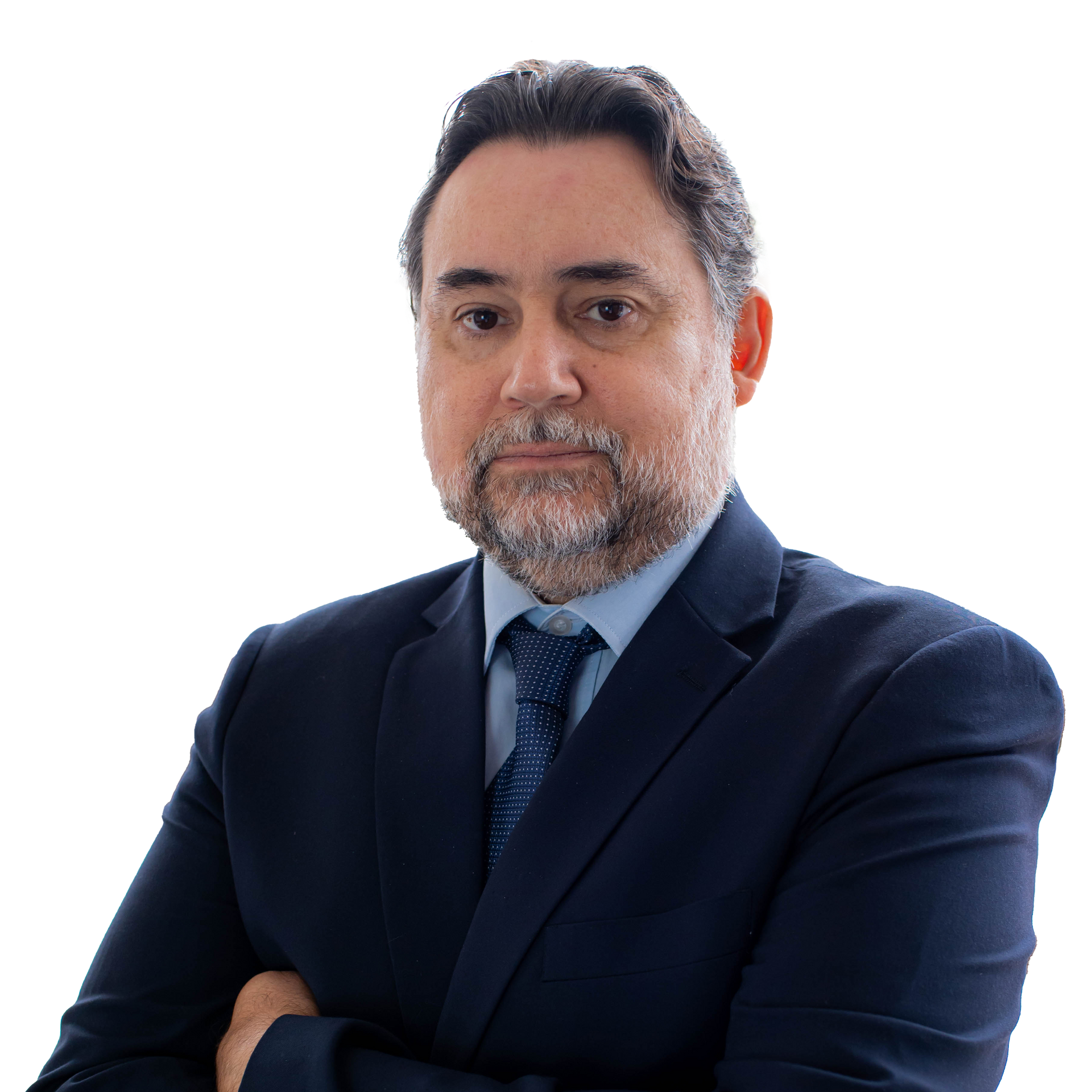 Um homem com barba está vestindo terno e gravata