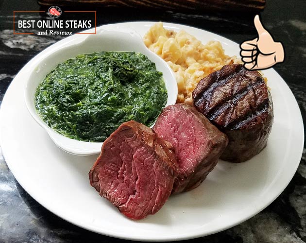 Plated with Creamed Spinach and Mac and Cheese. Great steaks for $18!