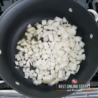 Add the onions to the pot, they should sizzle.