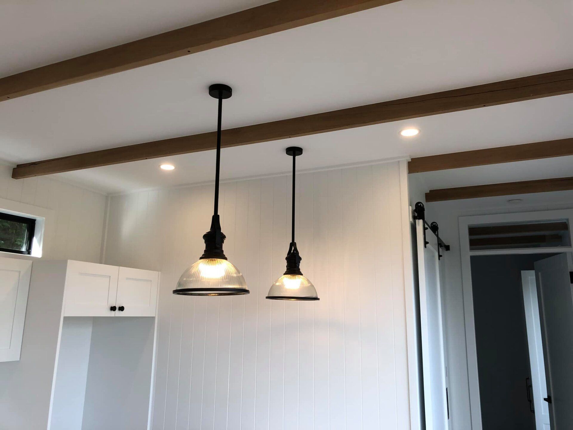 Electrician Carrying Cable Wire Portrait — Electrical Services in Renwick, NSW