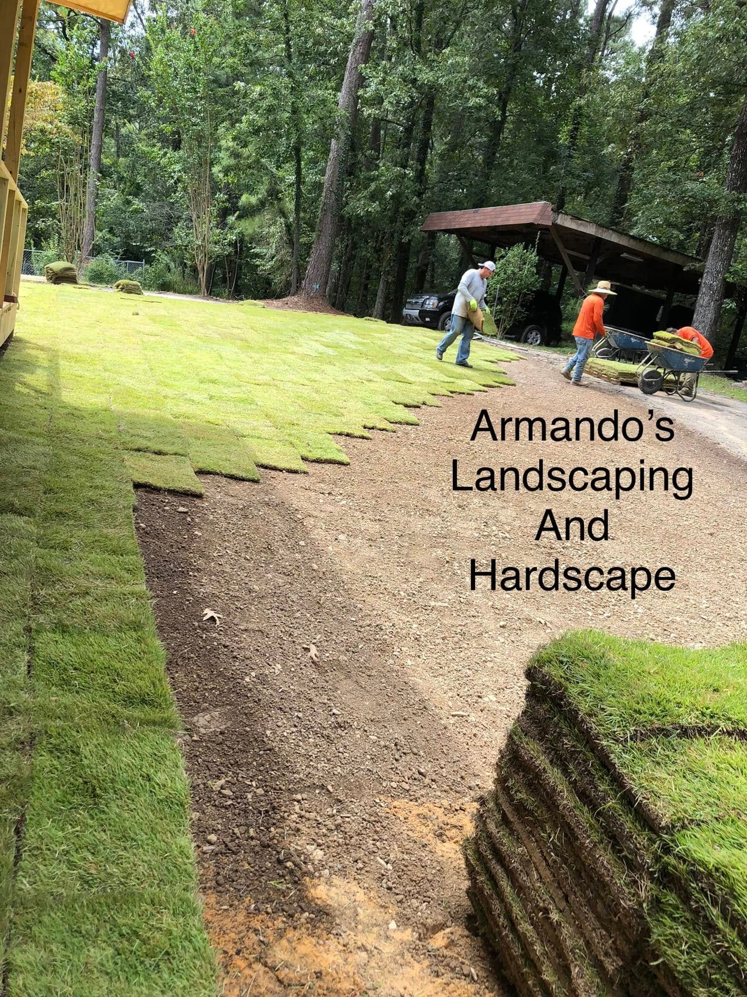 A stack of turf is being installed in a yard.