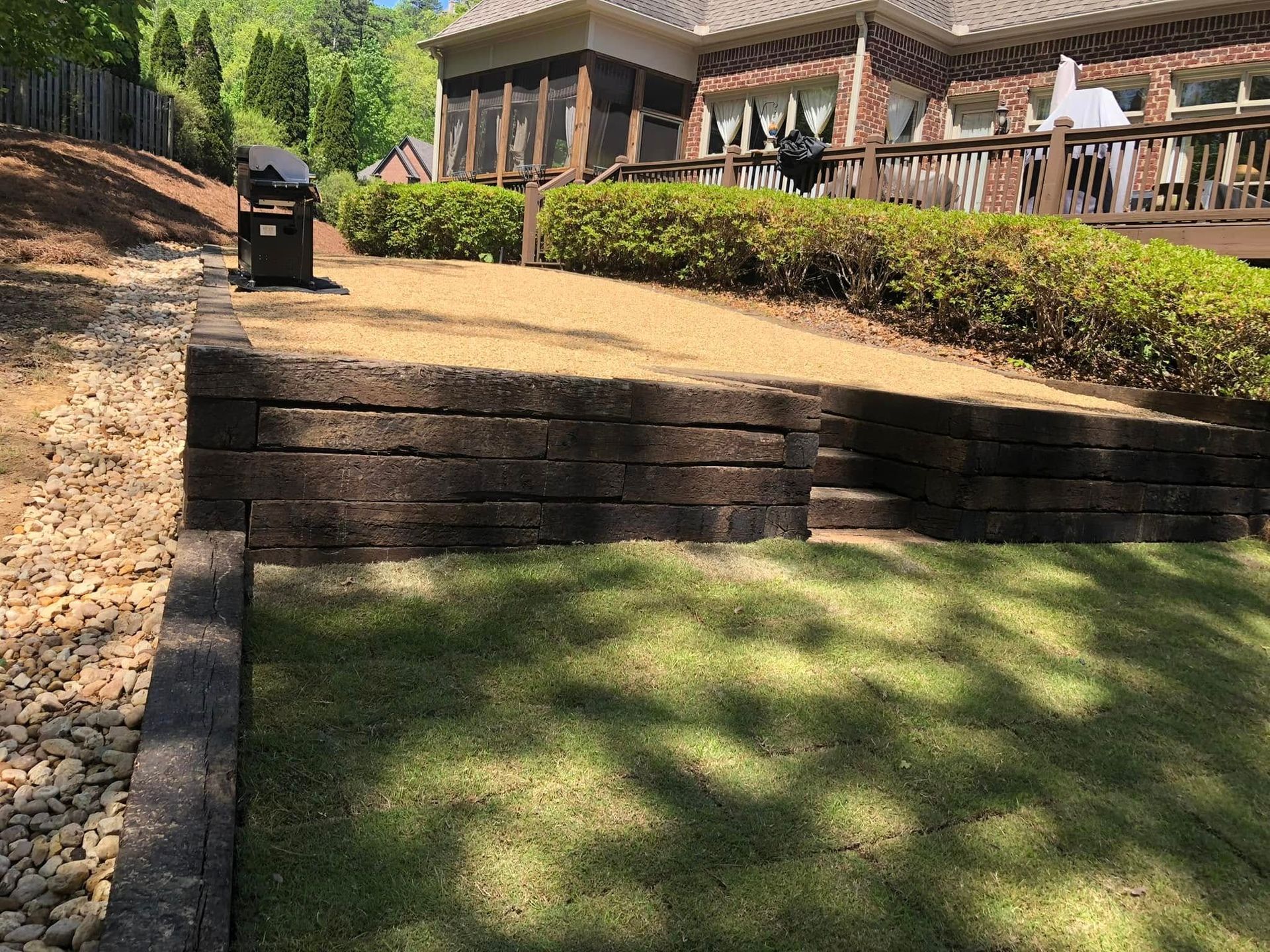 A large house with a large lawn in front of it.