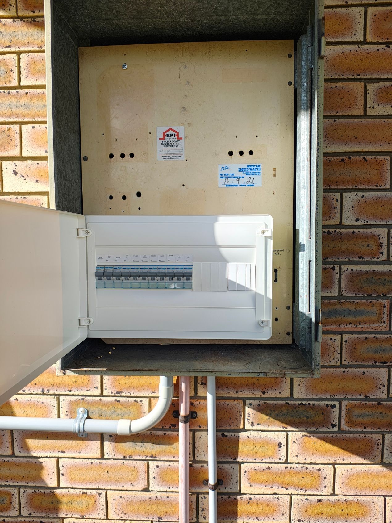 Electrical Circuit Breaker Box With Three Breakers in a Metal Enclosure — NTR Electrical In Toogoom, QLD