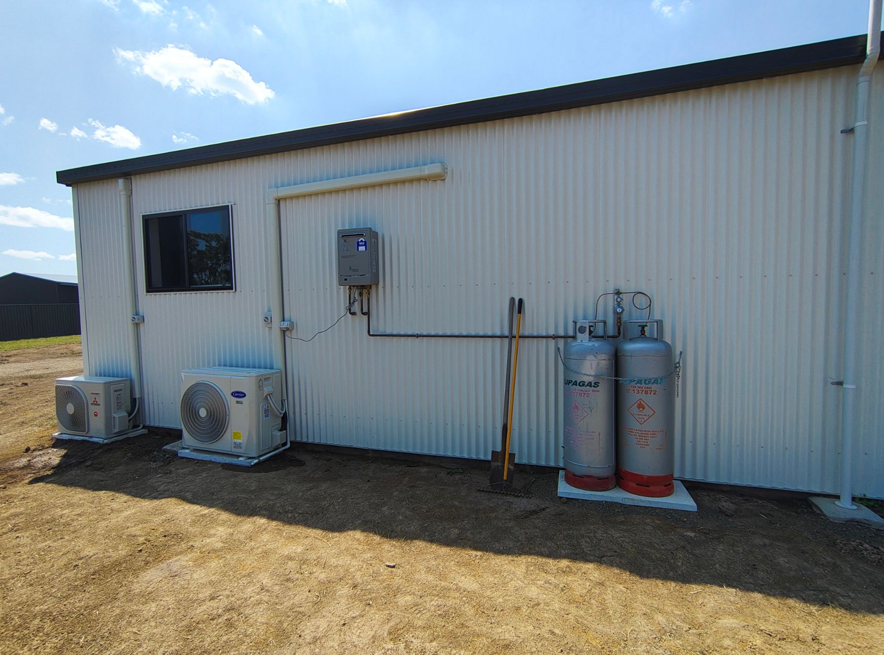 Bedroom With Bed, Nightstands, Window, Dresser, Speakers — NTR Electrical In Toogoom, QLD