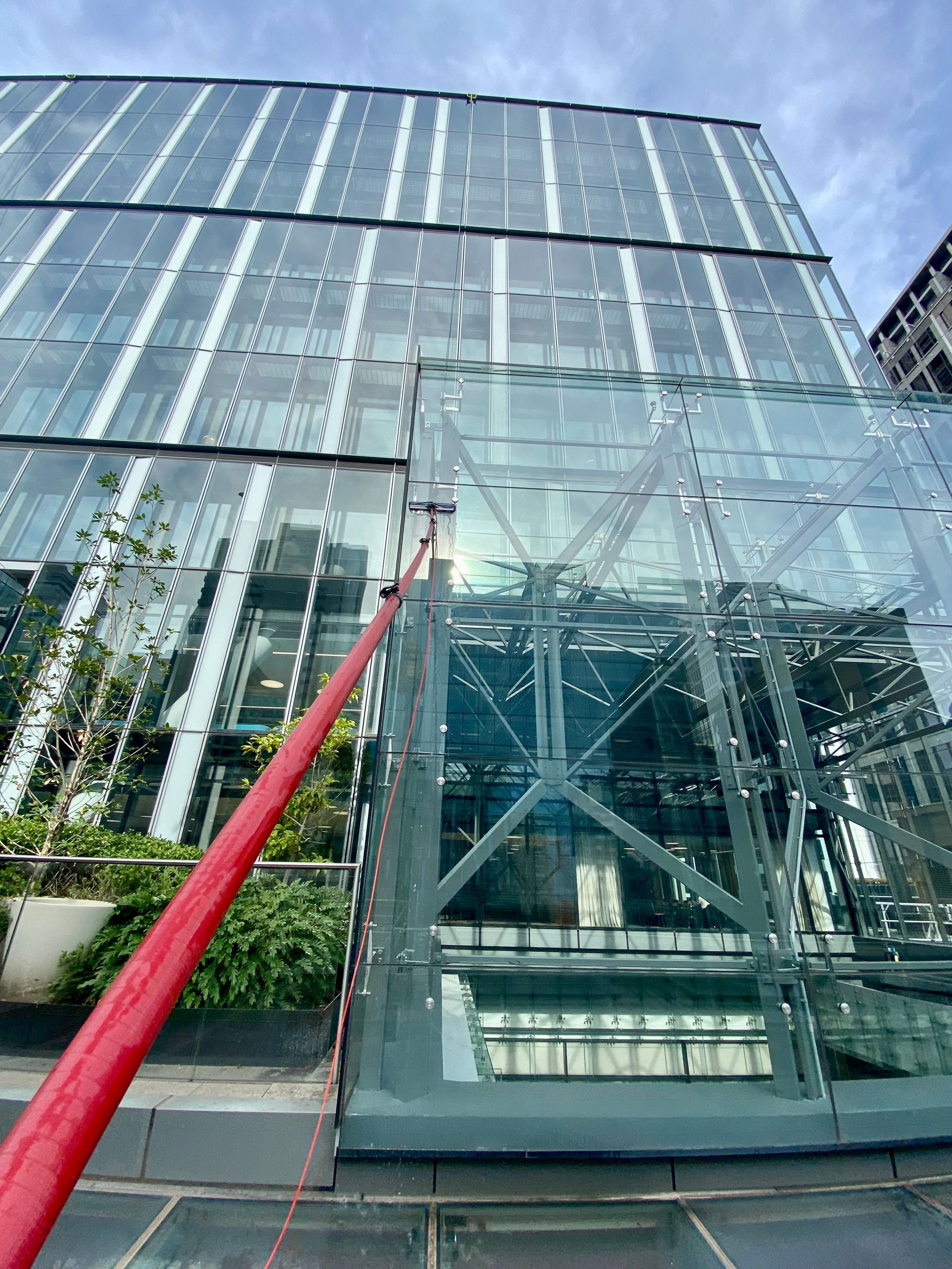 Looking Up At A Tall Building With A Lot Of Windows — Freshwater Exterior Cleaning in Lennox Head, NSW