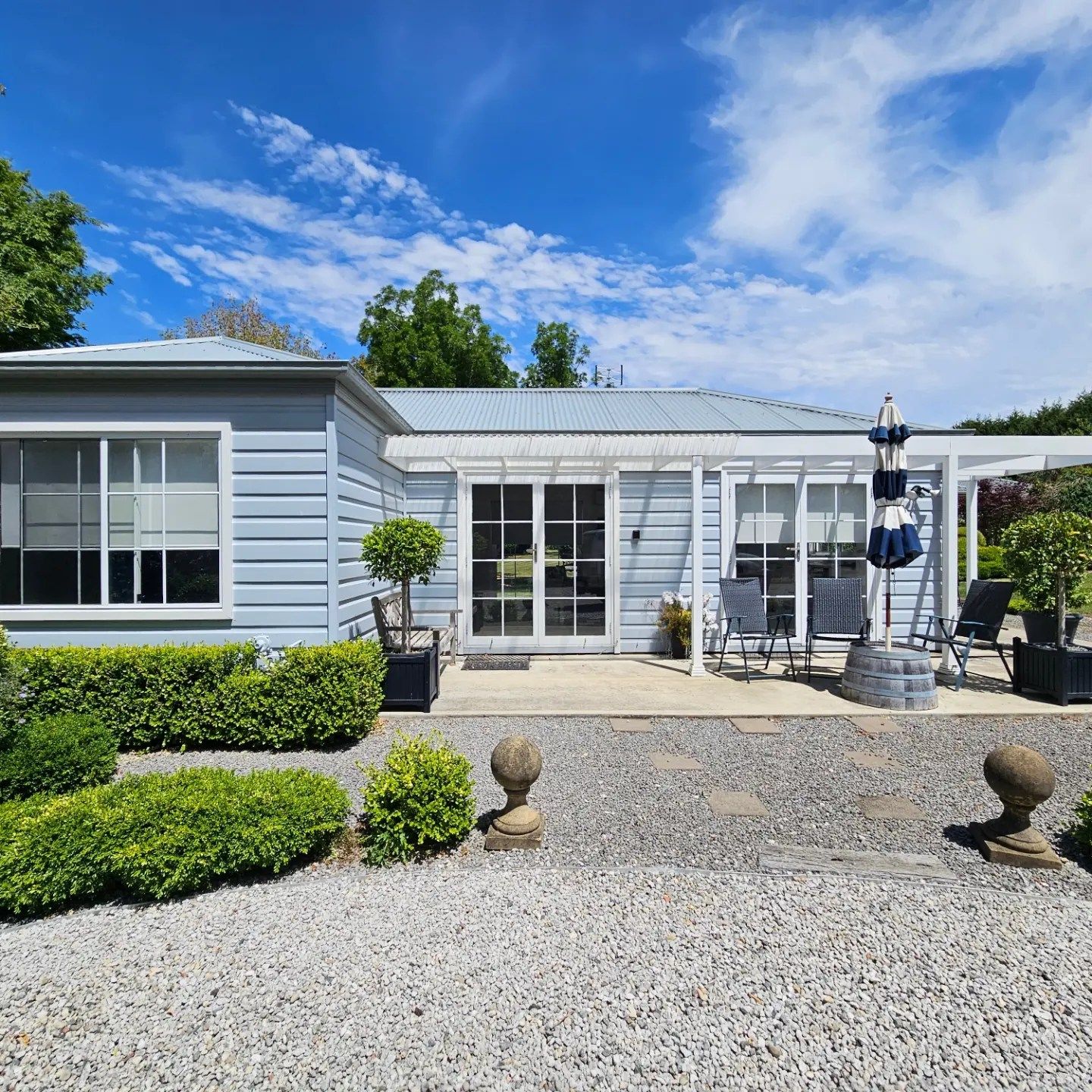 Kitchen And wooden Dining Table With Apples Kept In A Plate On Table — A Perfect Move And Clean In Welby NSW 