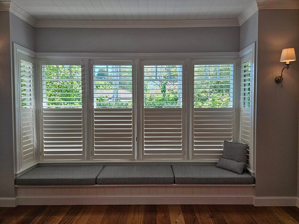 Bed, and a Pillow on it, Beside the Window with Shutters Blind — A Perfect Move And Clean In Bowral NSW
