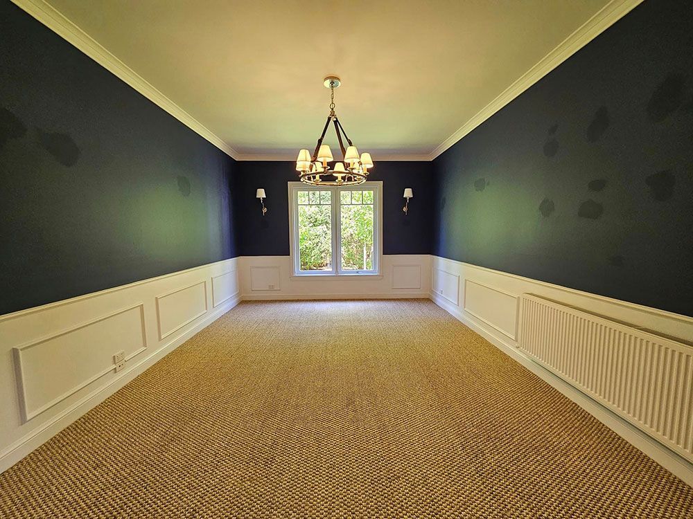 Big Spacious Room with Ceiling Lamp, Window and Two Lamps on the Wall — A Perfect Move And Clean In Welby NSW