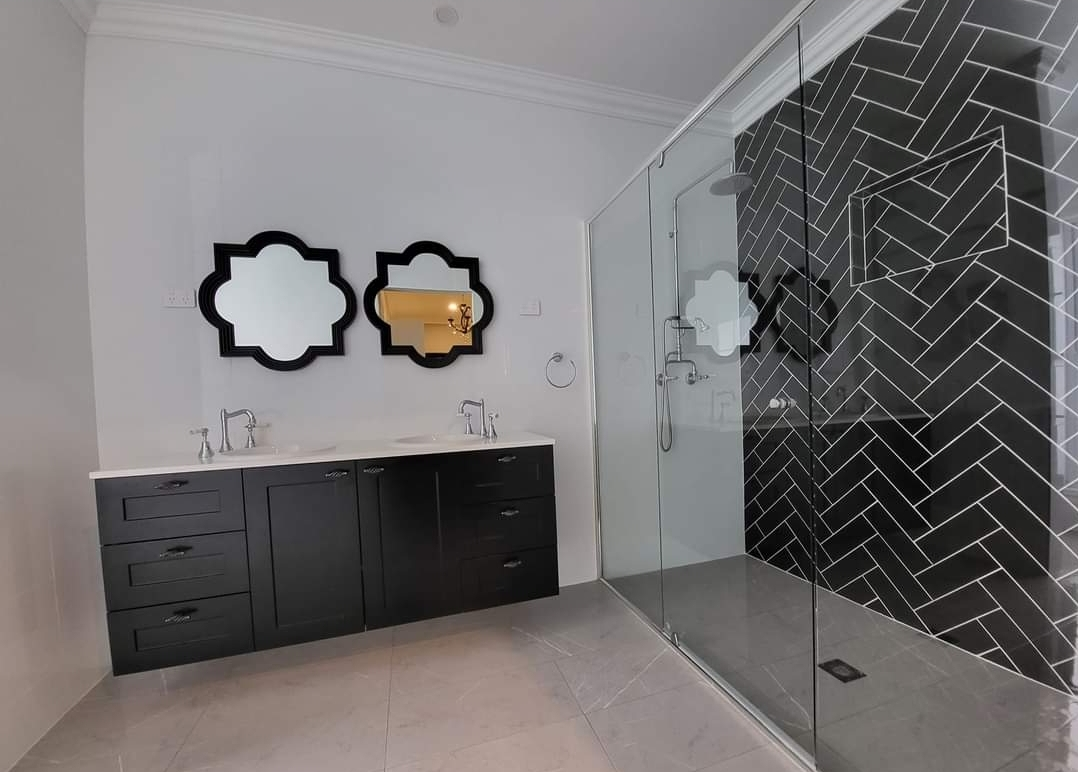 A bathroom with two sinks and a walk in shower — A Perfect Move And Clean In Bowral NSW