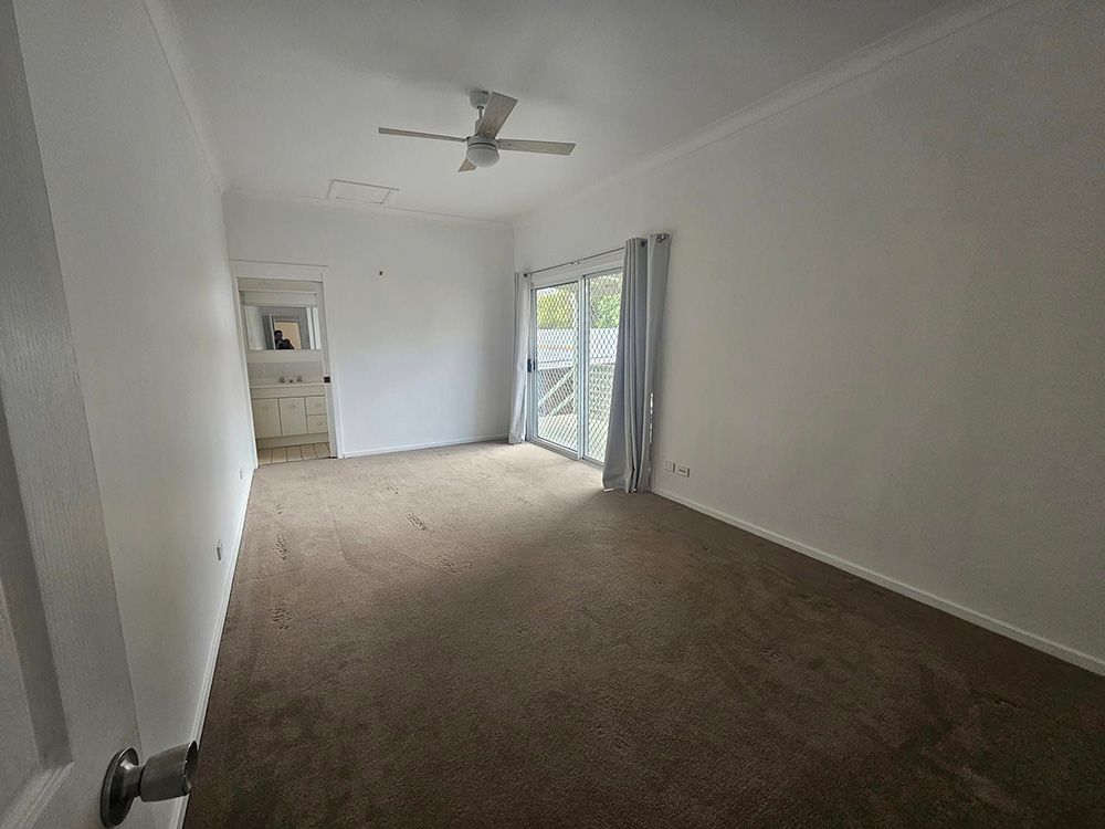 New Cleaned Room with Carpet on the Floor and a Window with open Curtains — A Perfect Move And Clean In Bowral NSW