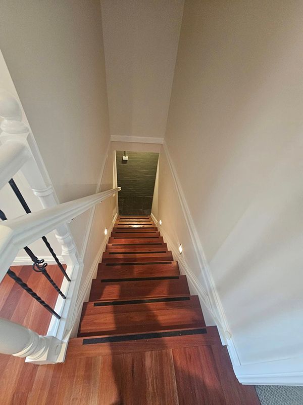 Wooden Stairs with White Walls and — A Perfect Move And Clean In Bowral NSW