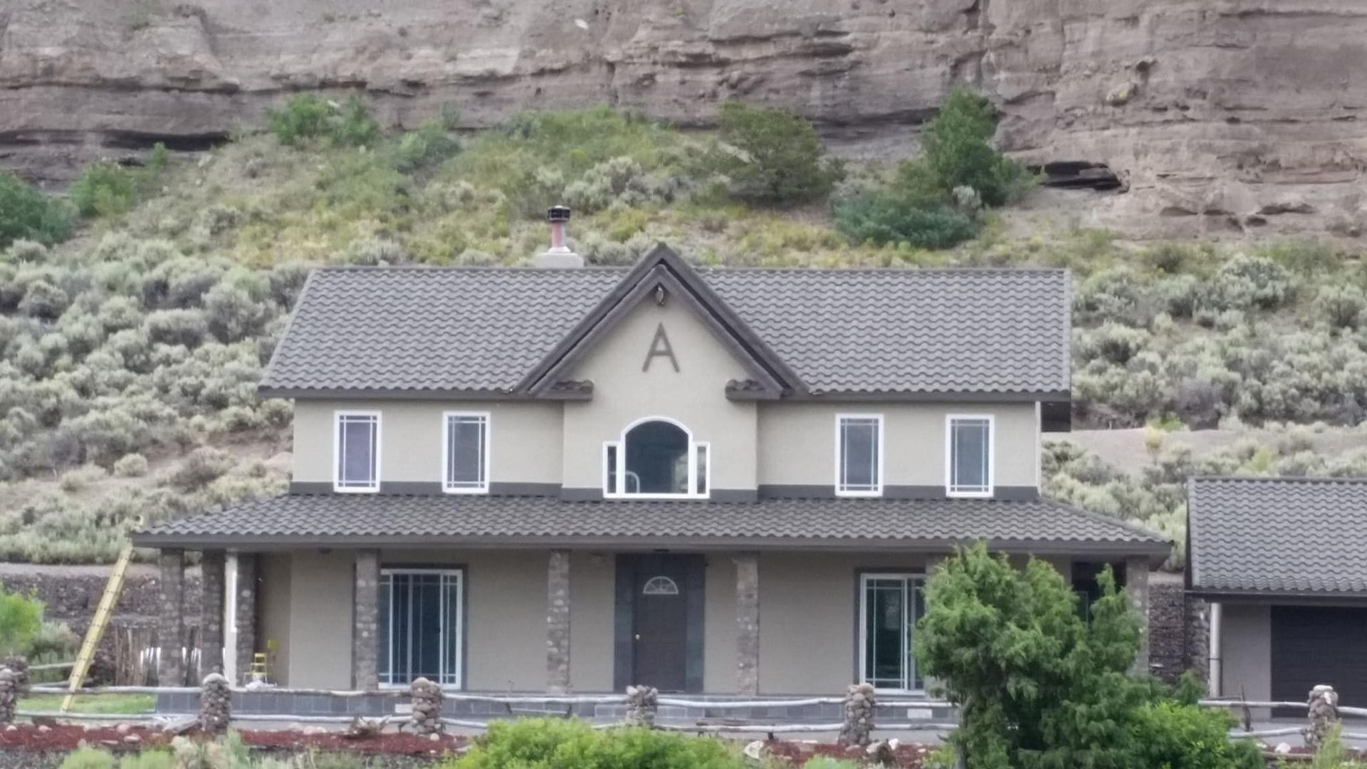 A house with the letter a on the front of it