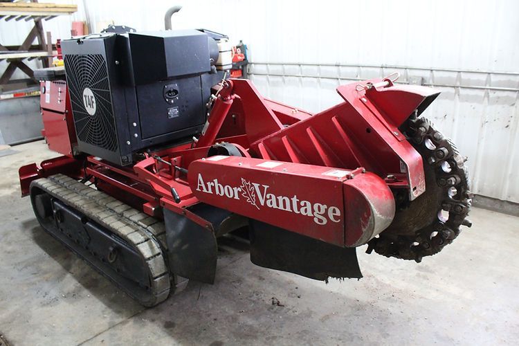 A red and black tree stump grinder called arbor vantage