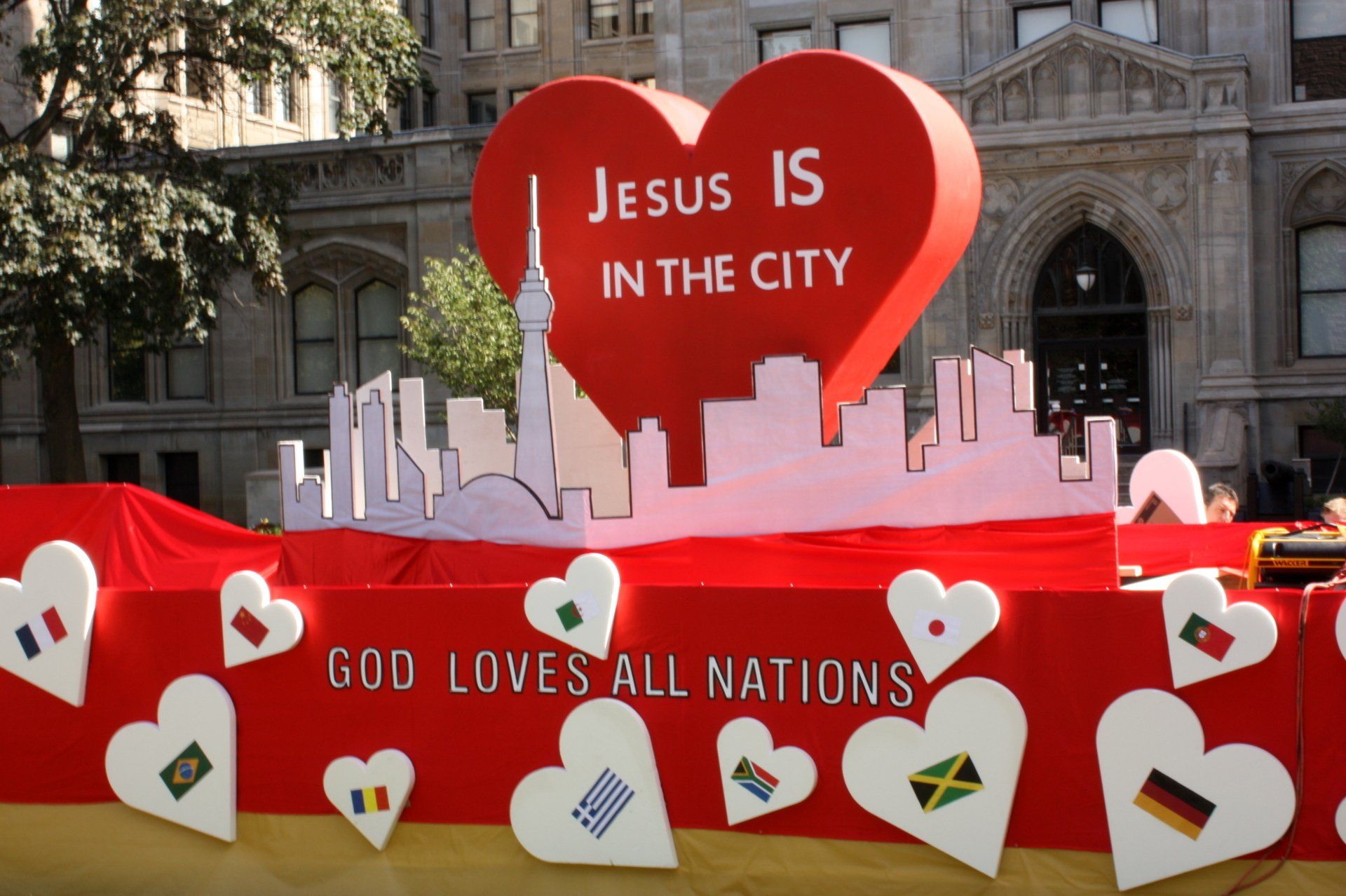 A large red heart that says jesus is in the city