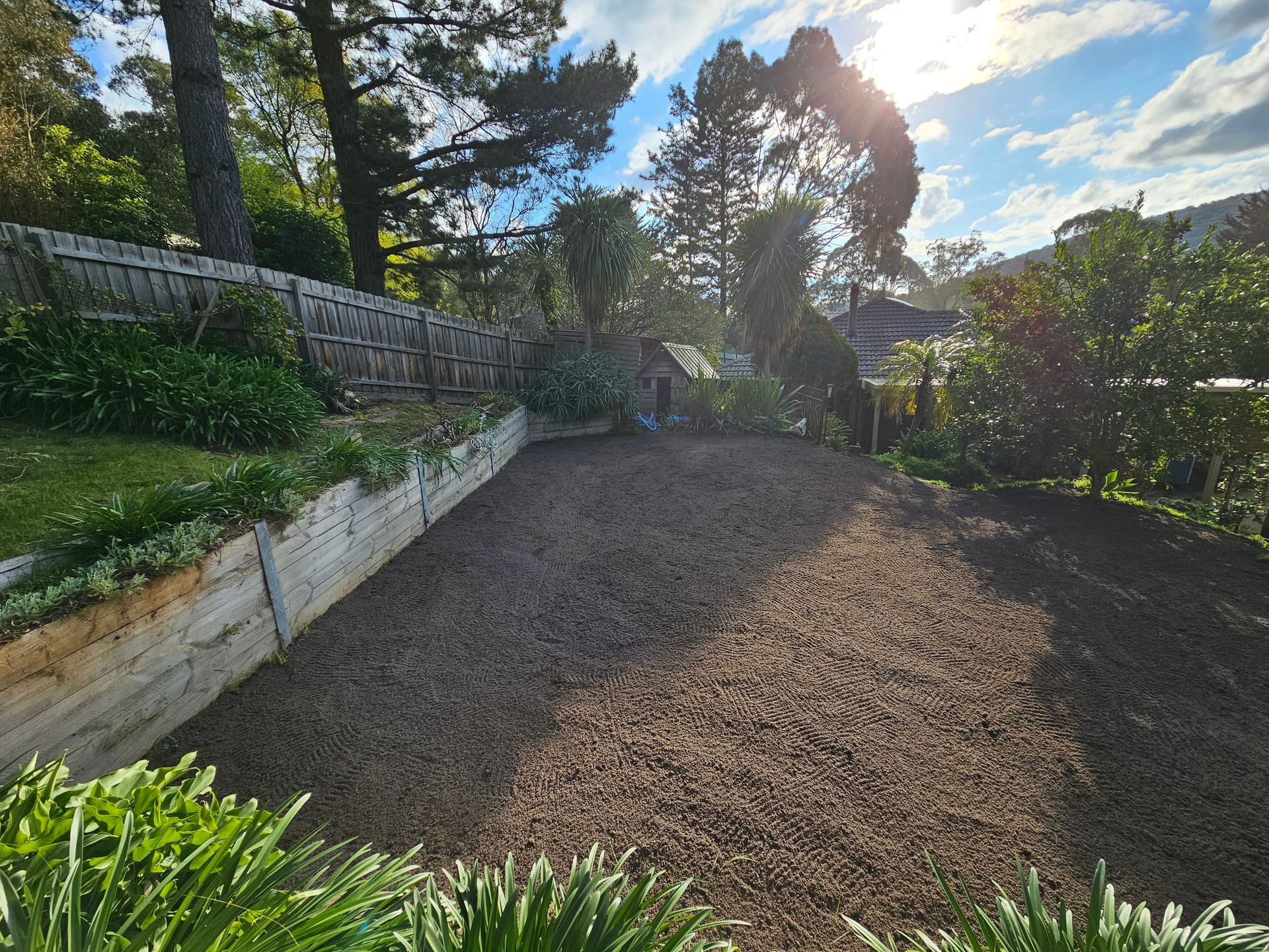 Sunny Garden Path Beside Terraced Stone Walls — All Over Pool Removals in Upwey, VIC