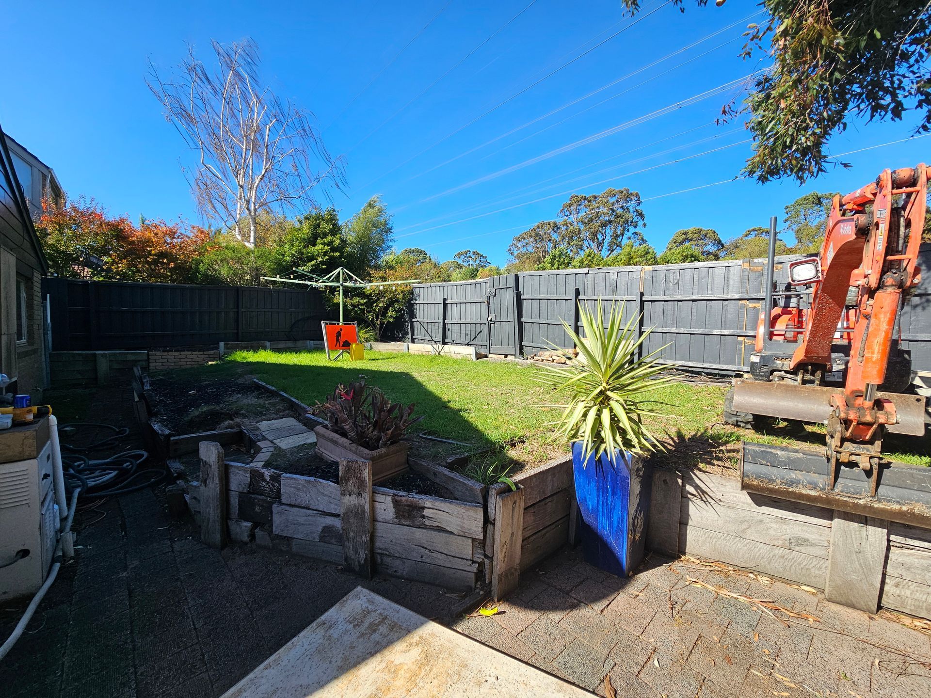 Excavator Bucket Digging a Trench in the Dirt — All Over Pool Removals in Upwey, VIC