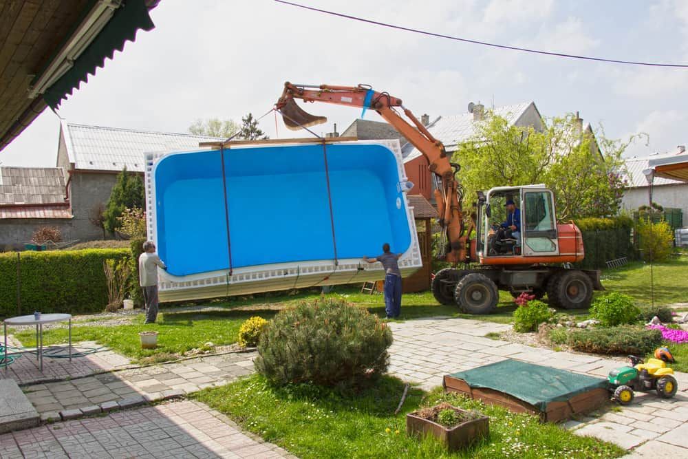Removing A Fibreglass Pool With an Excavator — All Over Pool Removals in Upwey, VIC