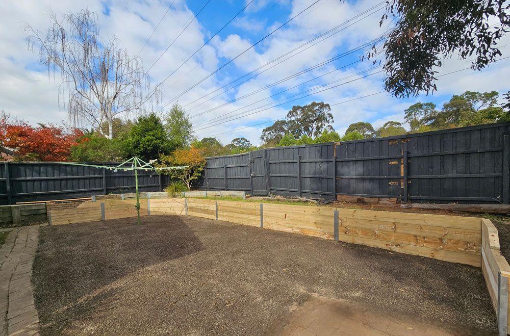 Backyard Showing Installation of Retaining Walls