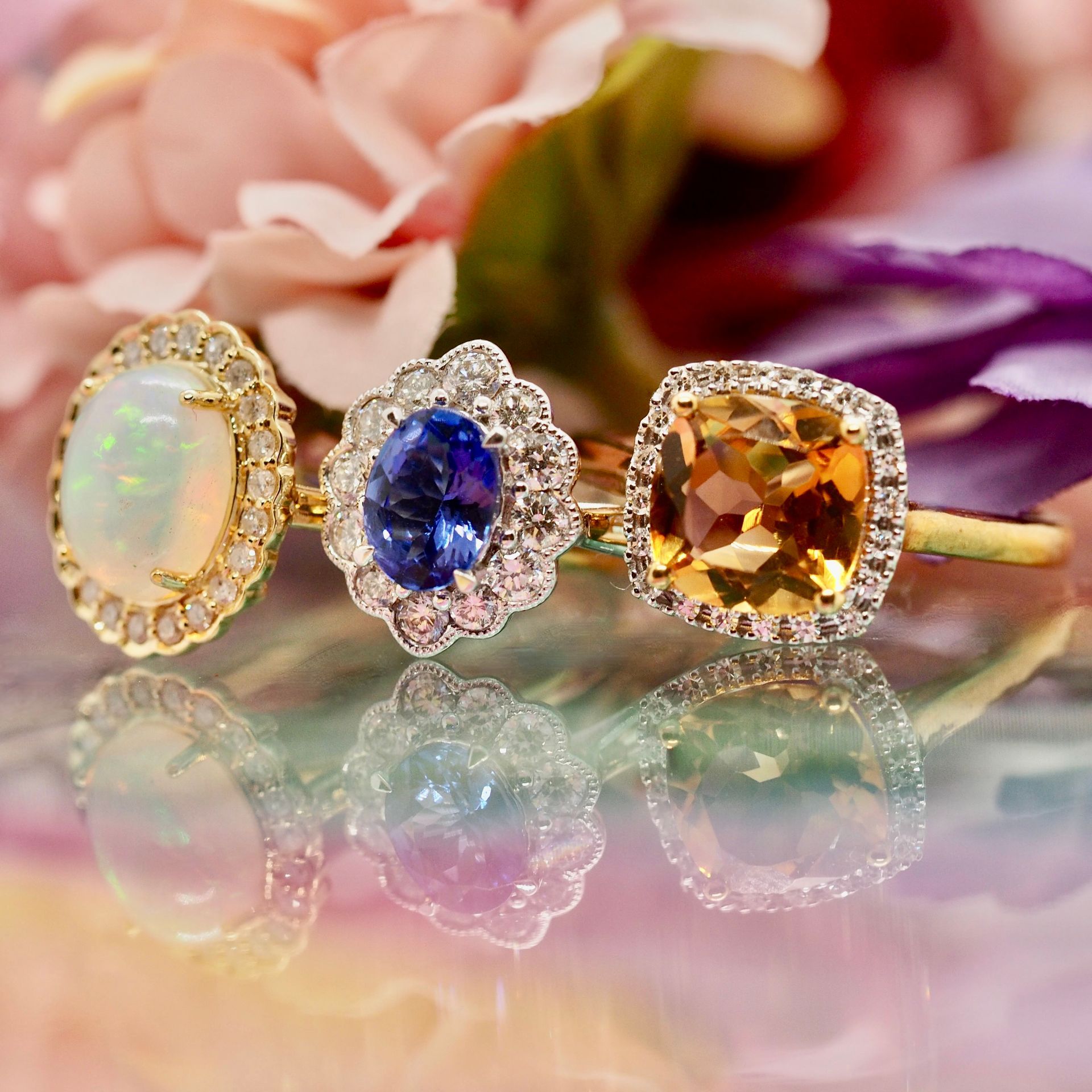 A display case filled with lots of jewellery and watches