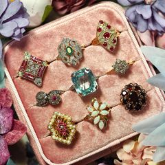 A variety of simpson rings are displayed in their boxes