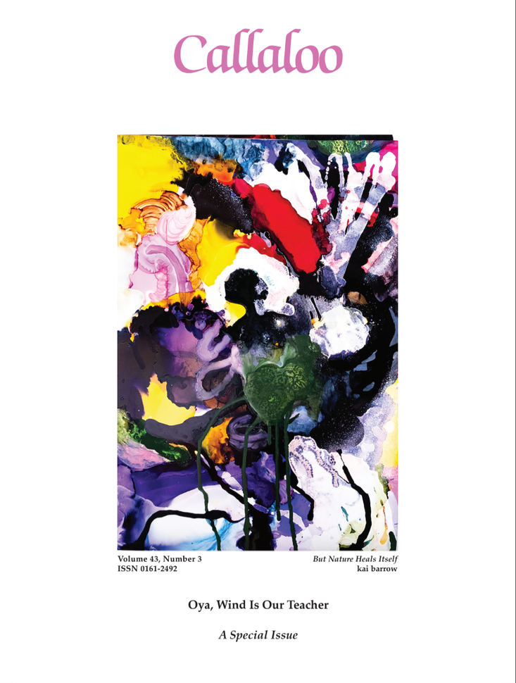 A black and white photo of a man in a suit standing in front of a crowd.