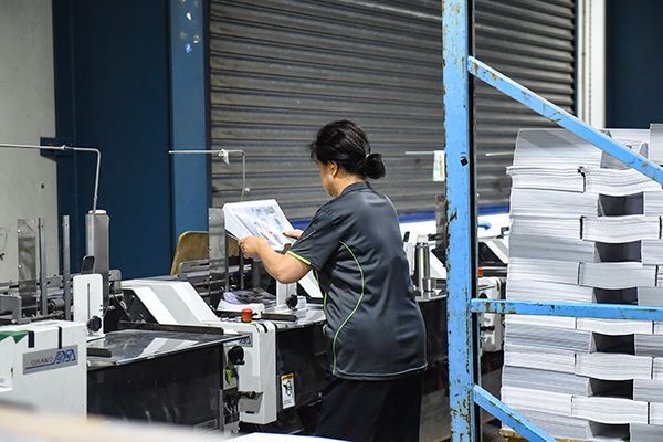 Worker on Machine — Wetherill Park, NSW — Bright Print Group